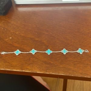 Silver bracelet with 5 turquoise “X”, 7.5 “ in length
